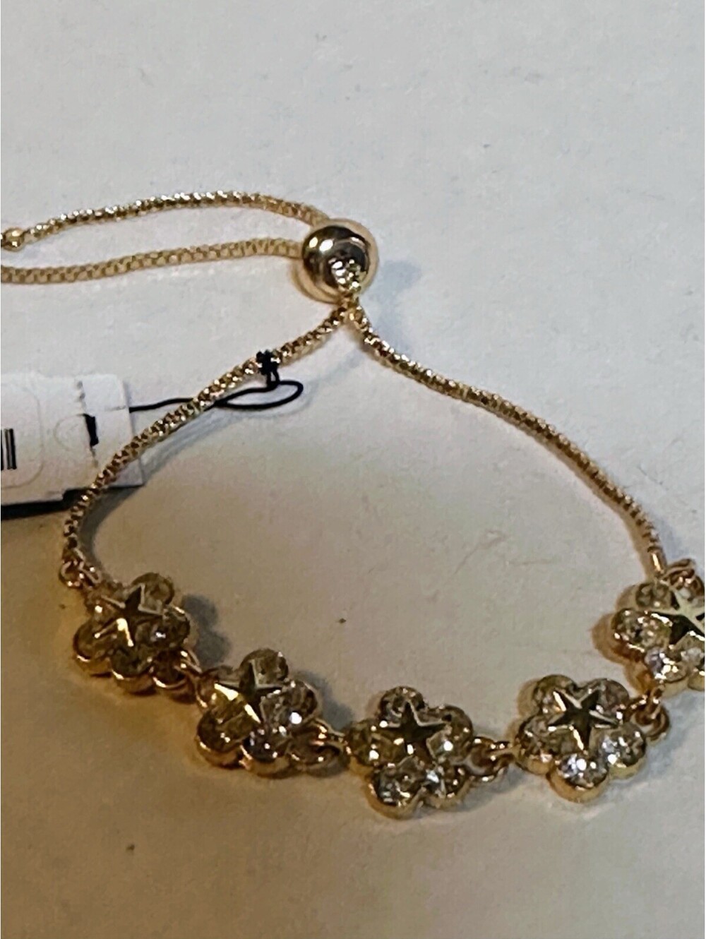 Guess Star Flower  shiny crystal rhinestones Goldtone Bracelet Adjustable NWT